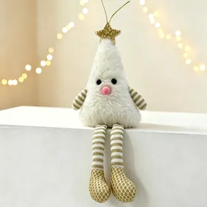 Close-up of plush white Christmas tree doll with long golden legs and a shiny star