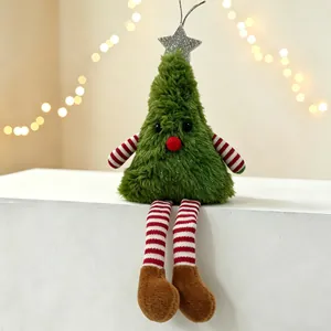 Detail of plush Christmas tree doll with striped long legs and silver star on top