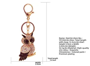 Detail view of the owl keychain showing 12.5cm length and 52.1g weight specifications