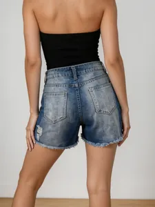 Women's denim shorts with back pockets, distressed holes and frayed tassel hem