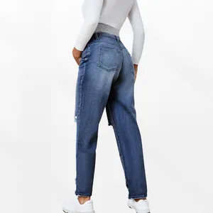 Detail view of maternity jeans with high grey elastic support band and back pockets