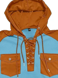 Detail of waffle knit fabric contrast hoodie with drawstring neck and flap pockets