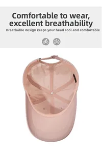 Detail of pink sports cap with breathable laser-cut holes and adjustable metal buckle