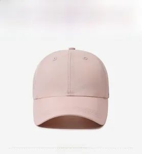 Front view of light pink quick-dry baseball cap with curved brim and breathable mesh