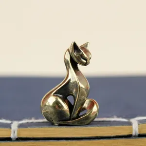 Miniature brass lucky cat figurine with vintage finish, size 3cm high by 2cm wide