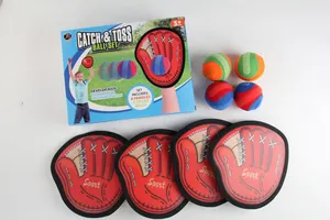 Detail of 4 red catch paddles and 4 multi-color sticky balls with retail packaging