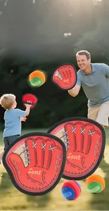 Close-up of the Sport Catch and Toss ball set featuring two paddles and three soft balls