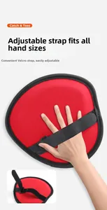 Detail of adjustable Velcro strap on red catch ball paddle for children and adults