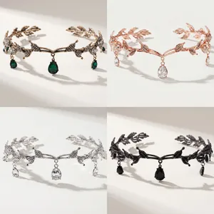 Detailed close-up showing rhinestone leaf headbands in four different metallic finishes