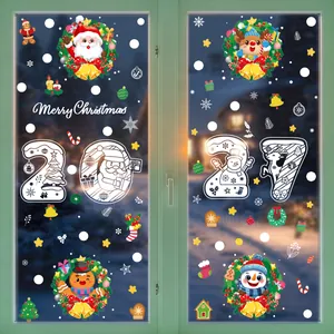 Detail of Christmas window decals featuring Santa, reindeer, and Merry Christmas text