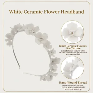 Handmade white ceramic flower headband with delicate bead accents for bridal hair styling