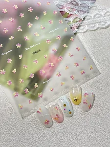 Close-up of floral nail art stickers YT8358 with pink and yellow flower patterns