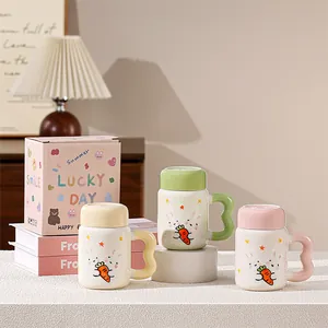 Detail of pink lucky rabbit ceramic mug with a unique wave handle and gift box packaging