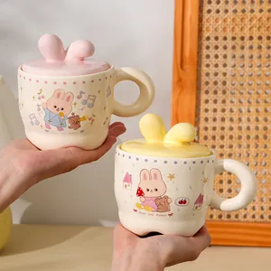 Pink ceramic rabbit mug with 3D ears lid and cute cartoon bear illustrations