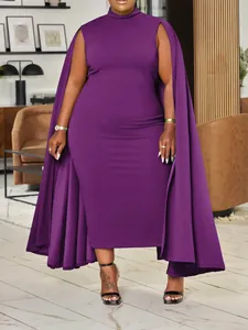 Detail of the high-neck purple cape dress showing the sleek texture and elegant drape