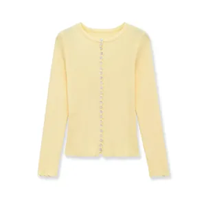 Pale yellow ribbed knit cardigan with round neck and white buttons on white background