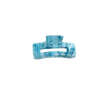 Rectangular hollow hair claw clip with blue and white marble ink pattern