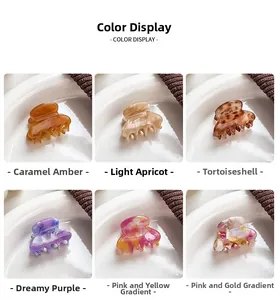 Close-up display of six stylish mini acetate hair claws in various patterns and colors