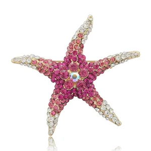 Elegant starfish brooch with sparkling rhinestones and pink gradient crystal tones