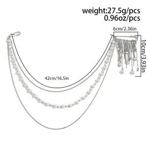 Detail of layered silver tassel chain brooch with white pearls and size specs