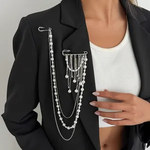 Hip-hop tassel chain brooch with silver metal pins and layered pearls on black suit