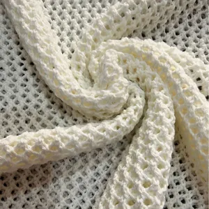 White crochet knit beach dress with deep V-neck and hollow out wavy pattern design
