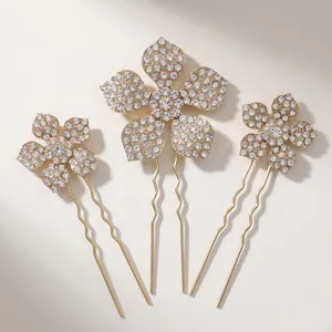 Drei-teiliges Set goldene Blumen-Haarnadeln mit funkelnden Kristallen und U-förmigem Design