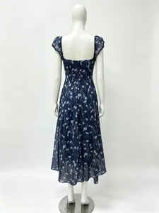 Rear view detail of the slim-fit floral maxi dress with back zipper and ruffle sleeves