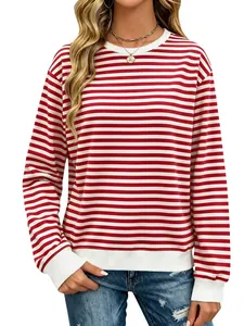 Close-up of red and white striped sweatshirt cuffs and soft cotton blend fabric detail