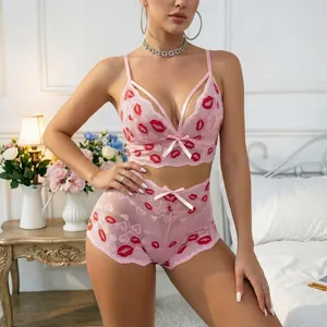 Sexy rosa Spitzenunterwäsche-Set mit roten Lippen, BH und Höschen für Damen
