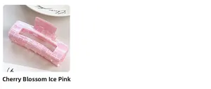Close-up of pink cherry blossom translucent hair claw clip with checkered texture