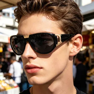 Close-up of men's sunglasses featuring gold bridge detail and luxury hollow side buckle