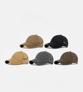 Detail of cotton baseball cap featuring side metal buckle and fine letter embroidery