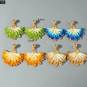 Detail view showing four pairs of bohemian fan-shaped tassel earrings with dimensions