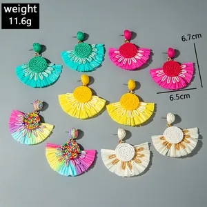 Detailed size view of colorful raffia fan fringe earrings in bohemian style