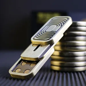 Macro view of multi-layer metal fidget slider with concentric oval textures