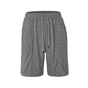 Men's grey casual shorts with elastic drawstring waist and textured jacquard fabric