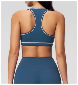 Macro detail of high-elastic racerback yoga bra with stylish contrast white stitching