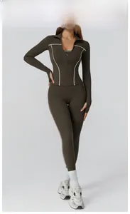 Women's deep roasted brown yoga set with contrast piping and thumbhole sleeves