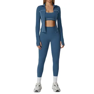 Three-piece hazy blue yoga set with zipper jacket and high-waisted leggings