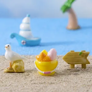 Miniature beach resin set with seagull, starfish bucket, and wooden sign decoration