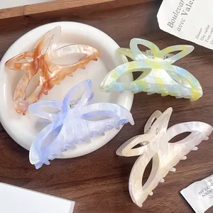 Lot de 4 pinces à cheveux papillon élégantes en acétate marbré pour chignons de style