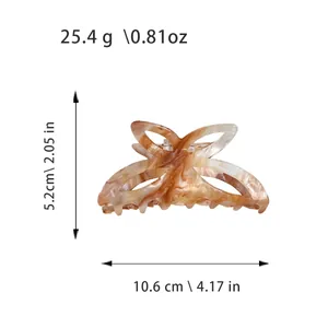Pince à cheveux papillon marbrée élégante avec dimensions et détails de poids