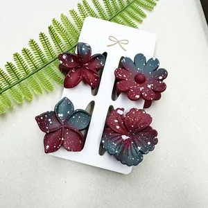 Detail von vier 4cm Frangipani-Haarklammern mit Farbverlauf und Spritzmuster-Textur