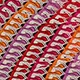 Détail macro d'un tissu tissé ondulé multicolore avec texture de broderie fine