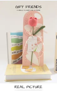 Hand-knitted pink tulip with Mother's Day tag and decorative pink arch card