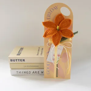 Handmade crochet orange lily bouquet with Mother's Day gift tag and elegant packaging