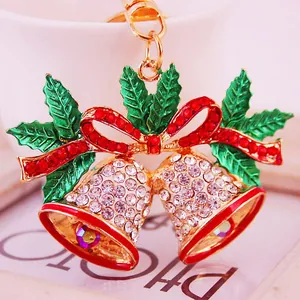 Christmas bell keychain with red rhinestones, green holly leaves and gold ring