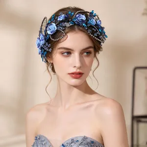 Vintage blue floral bridal headband with handcrafted crystals and fabric roses
