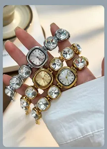 Close-up of luxury women watch with crystal link bracelet and square dial design